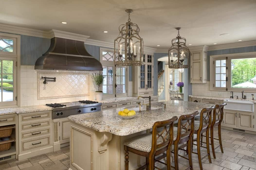 large white kitchen floor tiles show the area bigger